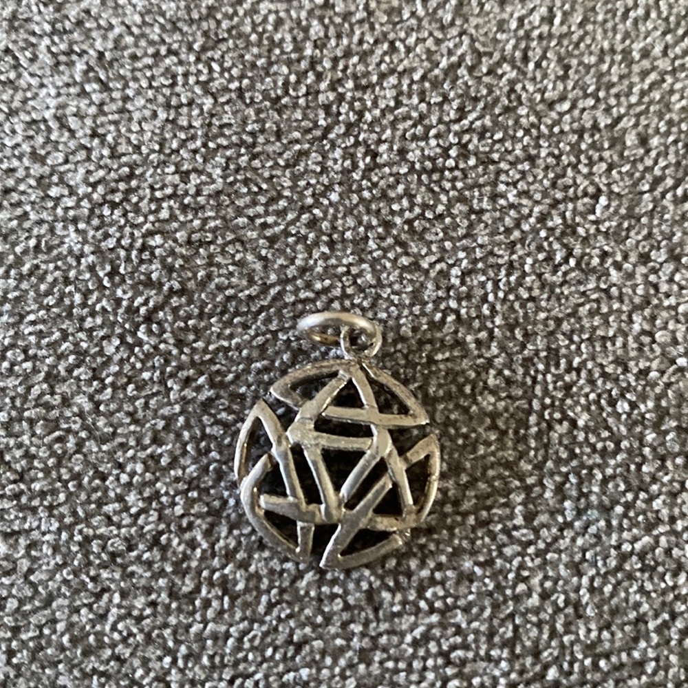 Silver tone pendant